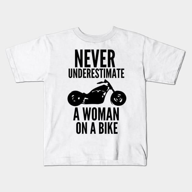 Never underestimate a woman on a bike Kids T-Shirt by mksjr